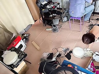 A naked maid is cleaning up in an stupid IT engineer&#039;s office. Real camera in office. Cam 1