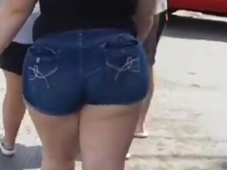 Big bbw ass in booty shorts walking at the car cruise