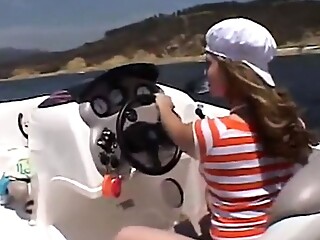 Sexy teen Little April playing with her snatch outdoors in rubber boat