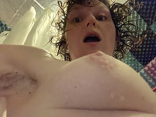 Get on your knees! For a super sexy POV of this hot hairy, natural MILF in the shower