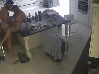60-01. Young pair sex on kitchen