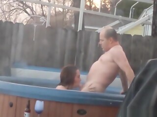 Rainy Day Doesnt Stop This Couple Fucking In Hot Tub