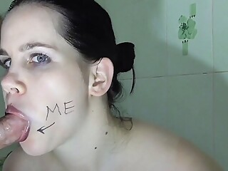 Hot bitch sucks dick and gets cum on her face. Sex service in the bathroom