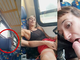 My friend masturbates me and I suck his cock travelling in a train with people