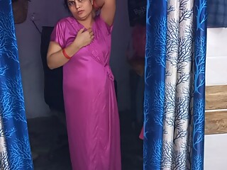 Cute Indian couple secretly having sex in red nightie